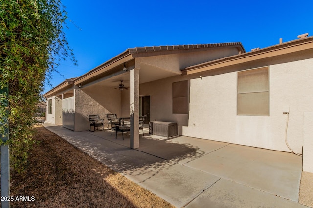 back of house featuring a patio and ceiling fan