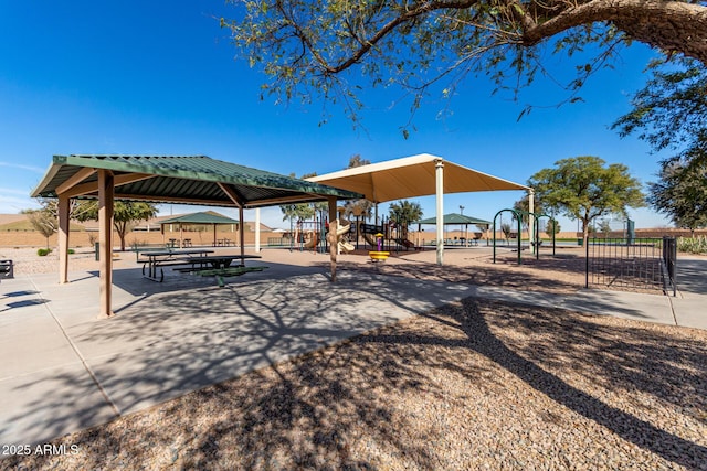 view of community featuring playground community and a gazebo