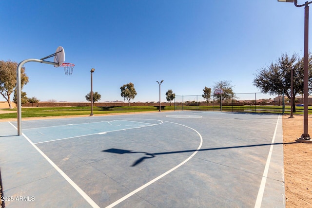 view of sport court with community basketball court and fence