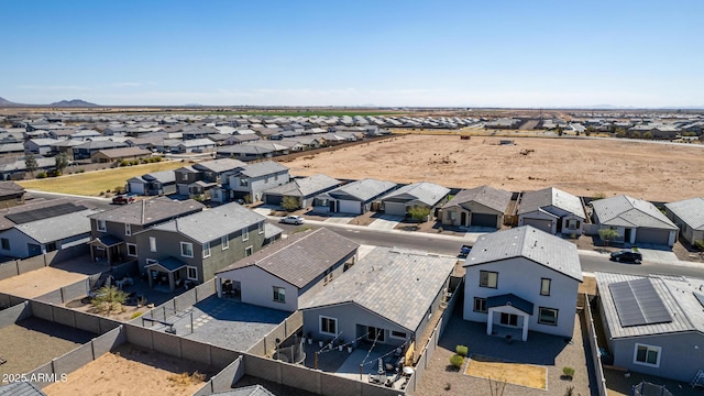 birds eye view of property with a residential view