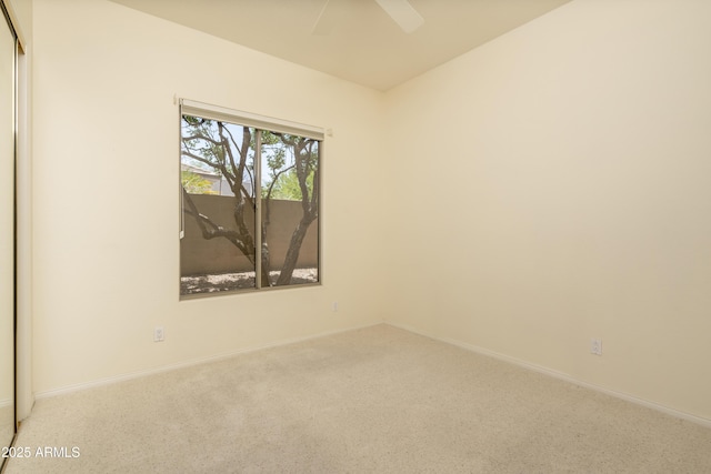6917 E Night Glow Cir, Scottsdale, AZ 85266 - carpeted spare room with baseboards and a ceiling fan