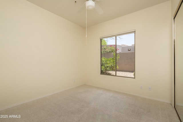 6917 E Night Glow Cir, Scottsdale, AZ 85266 - carpeted empty room with a ceiling fan and baseboards