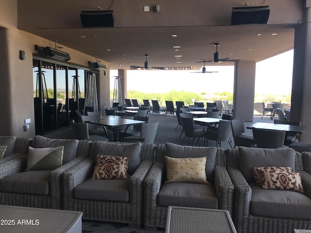 6917 E Night Glow Cir, Scottsdale, AZ 85266 - view of patio with a ceiling fan, an outdoor living space, and outdoor dining space