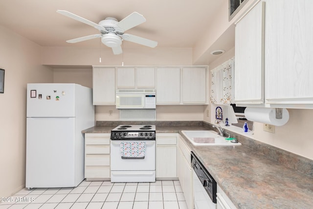 kitchen featuring visible vents, ceiling fan, light tile patterned floors, white appliances, and a sink