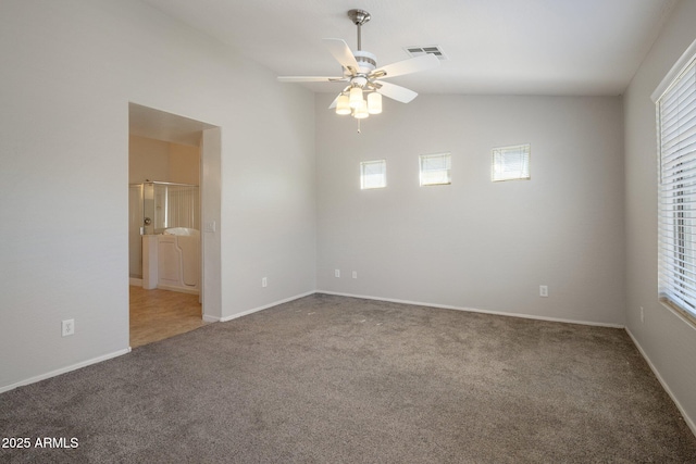 2615 W Silver Streak Way, San Tan Valley, AZ 85144 - carpeted empty room with healthy amount of natural light, ceiling fan, baseboards, and vaulted ceiling