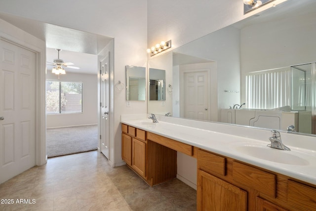 2615 W Silver Streak Way, San Tan Valley, AZ 85144 - full bathroom featuring double vanity, ceiling fan, a shower with shower door, and baseboards