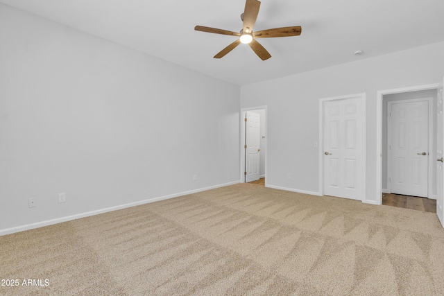 9261 W Sheridan St, Phoenix, AZ 85037 - unfurnished bedroom featuring carpet floors and a ceiling fan