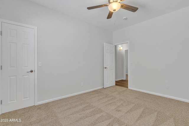 9261 W Sheridan St, Phoenix, AZ 85037 - empty room with carpet floors, a ceiling fan, and a smoke detector