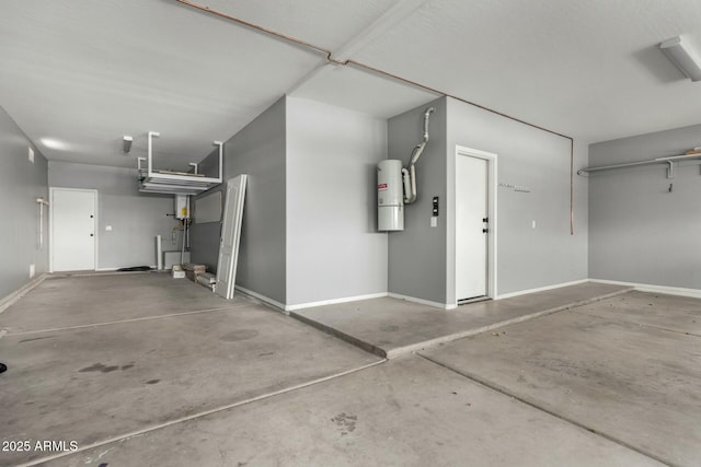 garage featuring baseboards