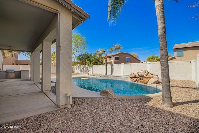 view of pool featuring a fenced backyard, area for grilling, a ceiling fan, a fenced in pool, and a patio area