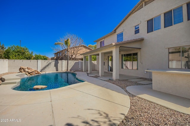 view of pool with a patio area, a fenced backyard, and a fenced in pool