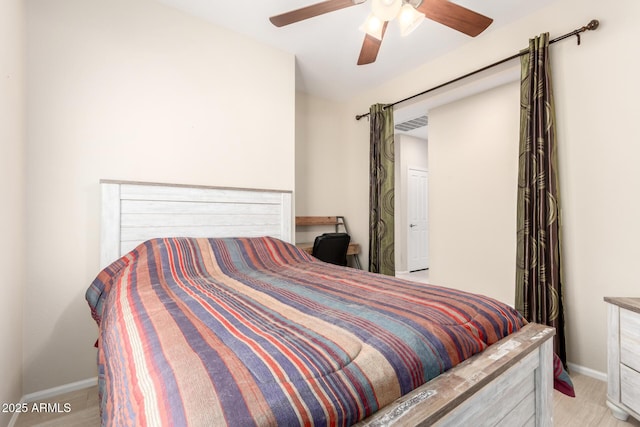 bedroom with visible vents, baseboards, and a ceiling fan