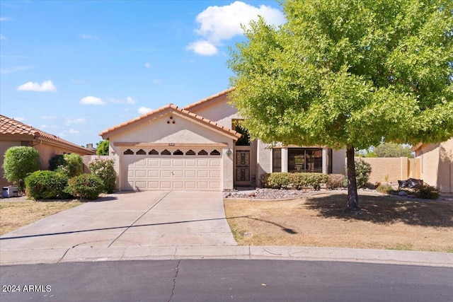 view of front of property featuring a garage