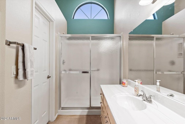 bathroom featuring vanity and walk in shower