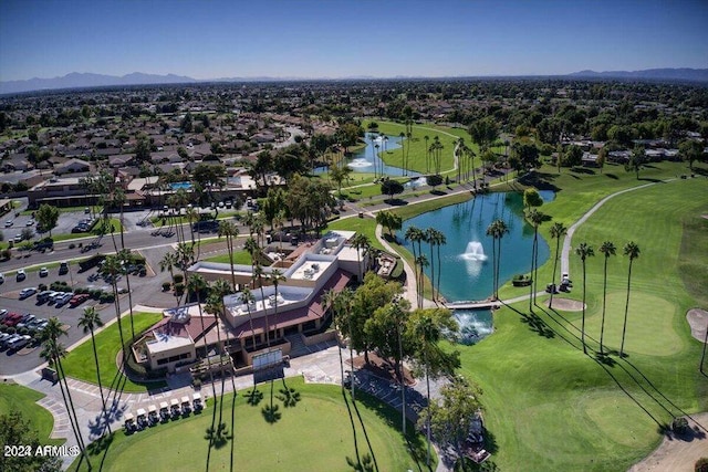 birds eye view of property featuring a water and mountain view