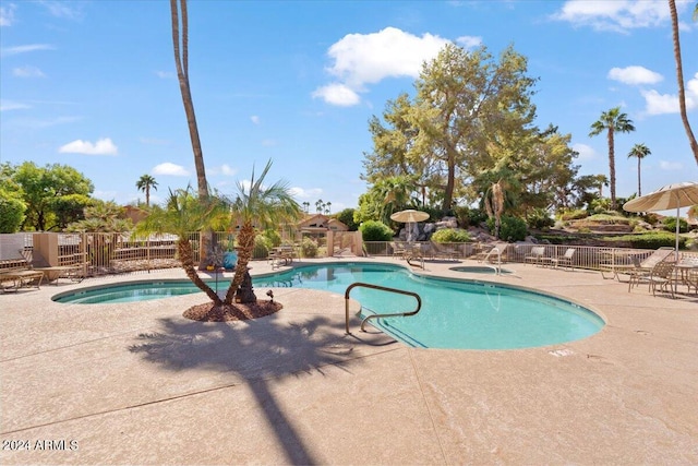 view of pool featuring a patio area