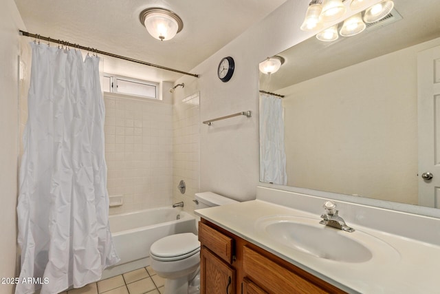 full bathroom with tile patterned floors, toilet, shower / tub combo, and vanity