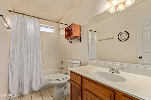 bathroom featuring tile patterned flooring, toilet, vanity, and shower / bath combo with shower curtain