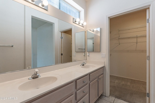 bathroom featuring vanity and tile patterned flooring