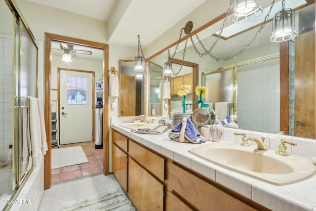 bathroom featuring vanity, tile patterned floors, and ceiling fan