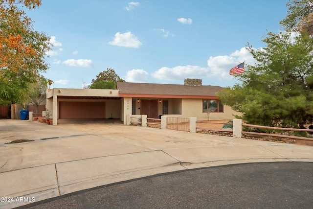 view of front of home featuring a carport