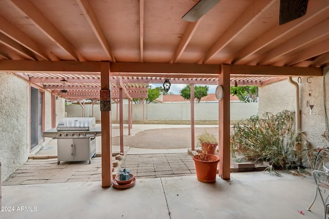 view of patio / terrace with a grill and a pergola