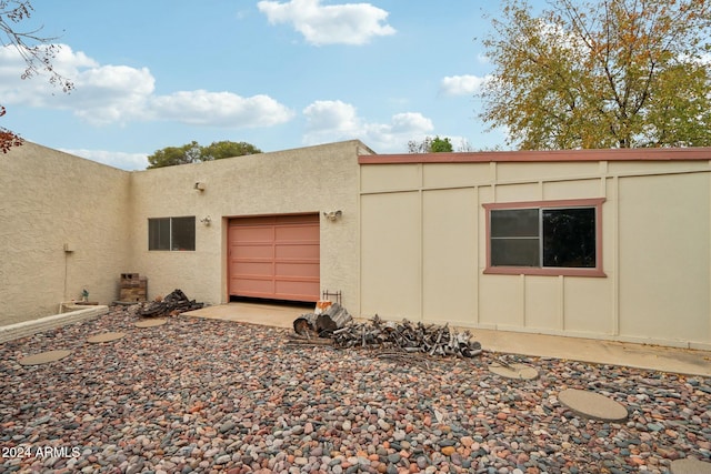 view of home's exterior featuring a garage