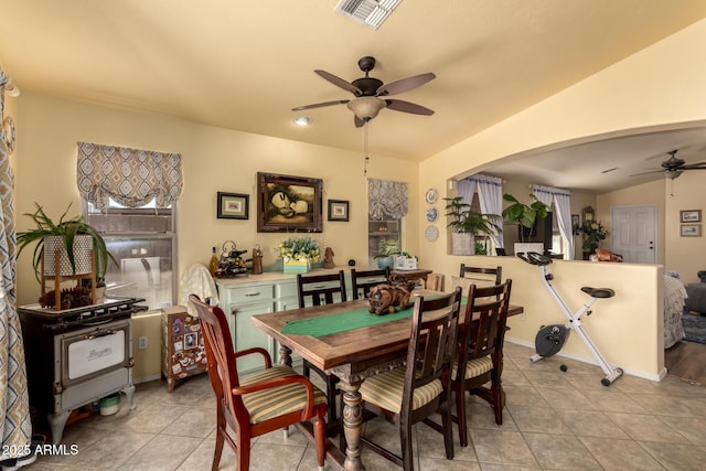 6031 N Milano Ct, Litchfield Park, AZ 85340 - dining space with a ceiling fan and light tile patterned floors