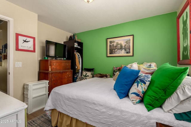 6031 N Milano Ct, Litchfield Park, AZ 85340 - bedroom featuring wood finished floors