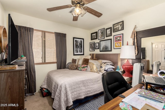 6031 N Milano Ct, Litchfield Park, AZ 85340 - carpeted bedroom featuring an office area and ceiling fan