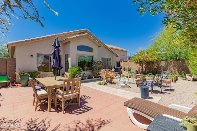 6031 N Milano Ct, Litchfield Park, AZ 85340 - view of patio / terrace featuring outdoor dining area and fence