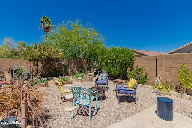 6031 N Milano Ct, Litchfield Park, AZ 85340 - view of patio with an outdoor fire pit and a fenced backyard