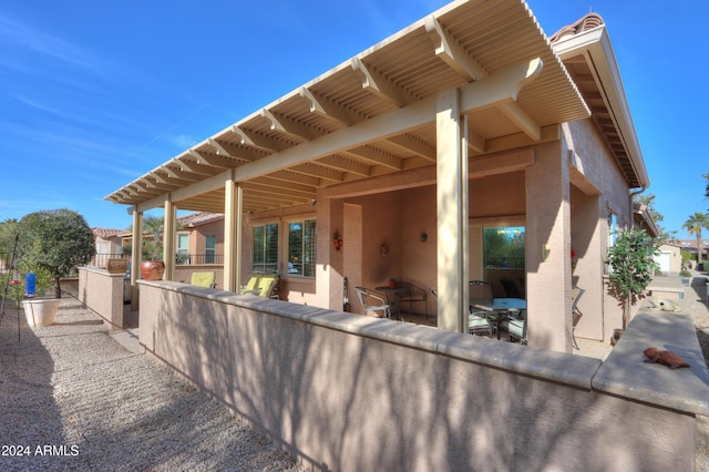 rear view of house with a patio area