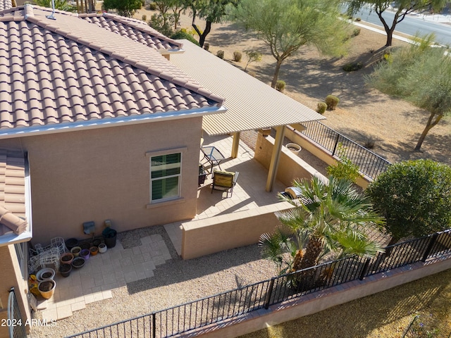 rear view of property with a patio area