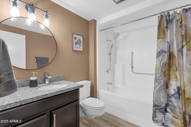 full bathroom with hardwood / wood-style flooring, vanity, toilet, and shower / bath combination with curtain