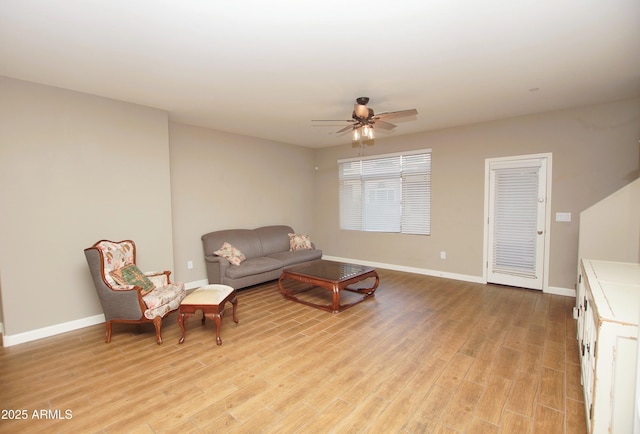 2150 W Alameda Rd Unit 1109, Phoenix, AZ 85085 - living area featuring light wood-type flooring, baseboards, and ceiling fan
