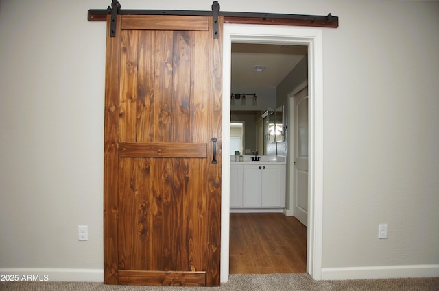 2150 W Alameda Rd Unit 1109, Phoenix, AZ 85085 - hallway with a sink, baseboards, and wood finished floors