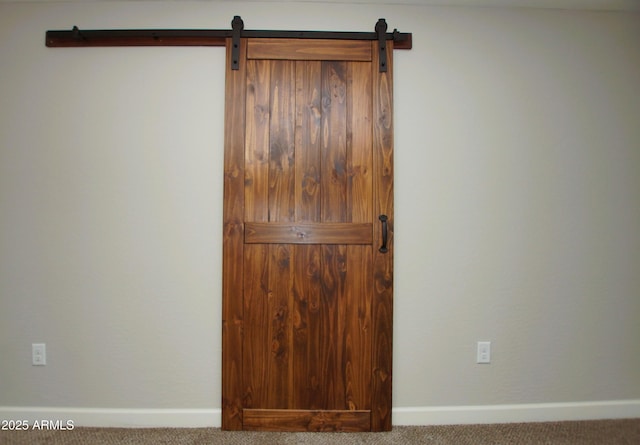 2150 W Alameda Rd Unit 1109, Phoenix, AZ 85085 - detailed view of carpet flooring, baseboards, and a barn door