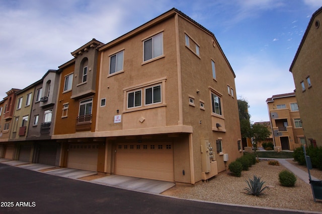 2150 W Alameda Rd Unit 1109, Phoenix, AZ 85085 - view of property with an attached garage