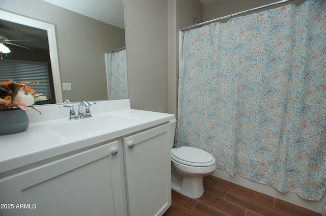 2150 W Alameda Rd Unit 1109, Phoenix, AZ 85085 - bathroom featuring ceiling fan, toilet, wood finished floors, vanity, and curtained shower