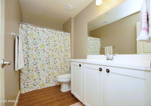 2150 W Alameda Rd Unit 1109, Phoenix, AZ 85085 - bathroom with toilet, wood finished floors, vanity, and a shower with curtain