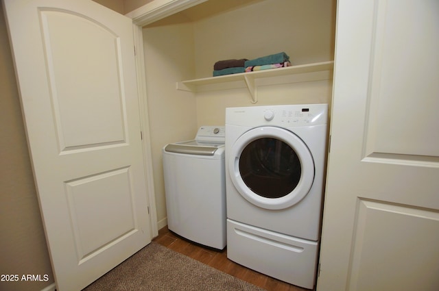 2150 W Alameda Rd Unit 1109, Phoenix, AZ 85085 - washroom featuring washer and clothes dryer and wood finished floors