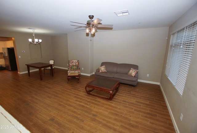 2150 W Alameda Rd Unit 1109, Phoenix, AZ 85085 - living room with baseboards, light wood-type flooring, ceiling fan, and a chandelier