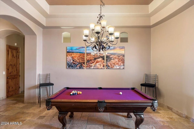 playroom featuring baseboards, arched walkways, stone tile flooring, and pool table