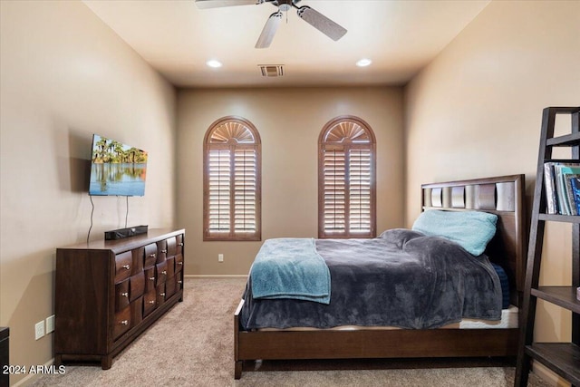 bedroom with recessed lighting, visible vents, baseboards, and light colored carpet