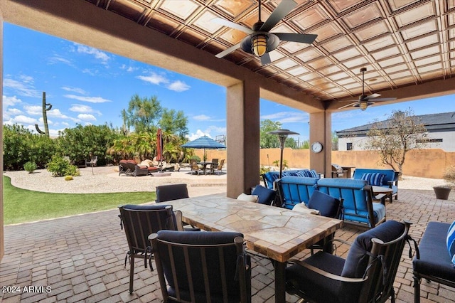 view of patio featuring outdoor dining area and an outdoor living space