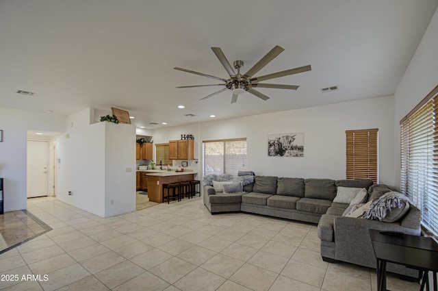 2325 S 88th Dr, Tolleson, AZ 85353 - living room with light tile patterned floors and ceiling fan