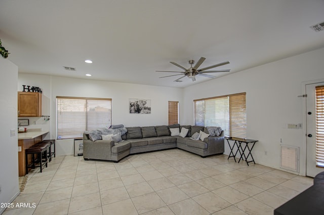 2325 S 88th Dr, Tolleson, AZ 85353 - tiled living room featuring plenty of natural light and ceiling fan