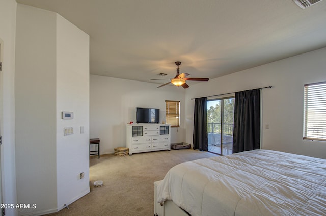 2325 S 88th Dr, Tolleson, AZ 85353 - carpeted bedroom with ceiling fan and access to exterior