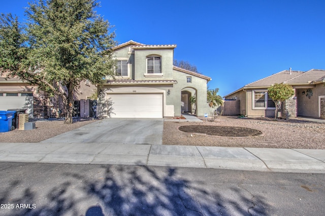 view of front of property featuring a garage